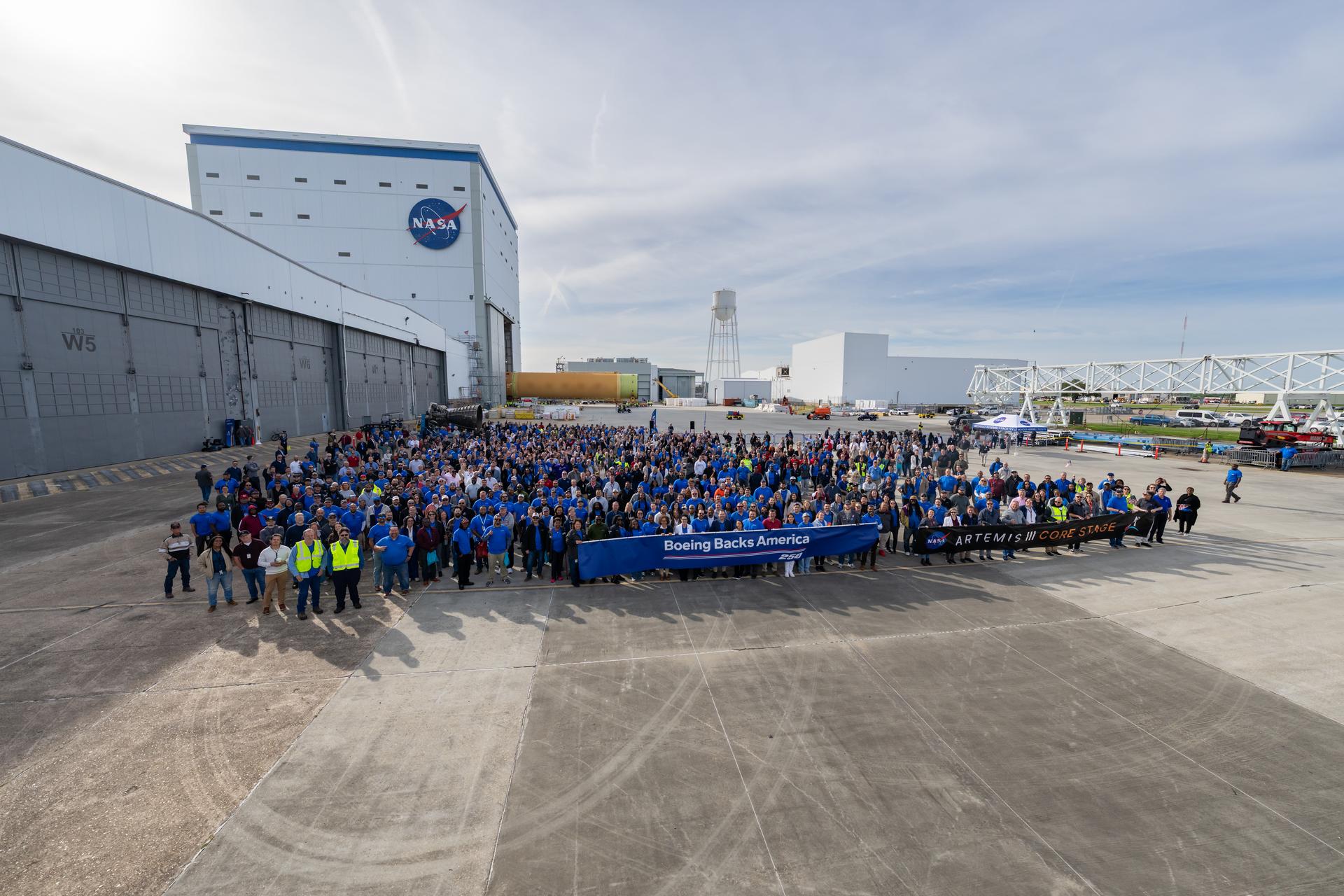 NASA moved the core stage, or the largest section, of the SLS (Space Launch System) rocket that will launch the crewed Artemis III mission in 2027 from the agency’s Michoud Assembly Facility to the agency’s Pegasus barge in New Orleans on April 20. The barge will ferry the top four-fifths – the section containing the liquid hydrogen tank, liquid oxygen tank, intertank, and forward skirt – of the SLS core stage to NASA’s Kennedy Space Center in Florida to complete outfitting and vertical integration.  Teams with NASA and Boeing, the SLS core stage lead contractor, used specialized transporters to guide the top four-fifths from the NASA rocket factory to Pegasus. Prior to the move, technicians added an engine section transportation simulator to the rocket stage for shipment to the Space Coast.  Next year’s Artemis III mission will launch astronauts to Earth’s orbit aboard the Orion spacecraft on top of SLS to test rendezvous and docking capabilities between Orion and commercial spacecraft needed to land Artemis IV astronauts on the Moon in 2028. NASA’s SLS is the only rocket capable of sending Orion, astronauts, and supplies to the Moon in a single launch.